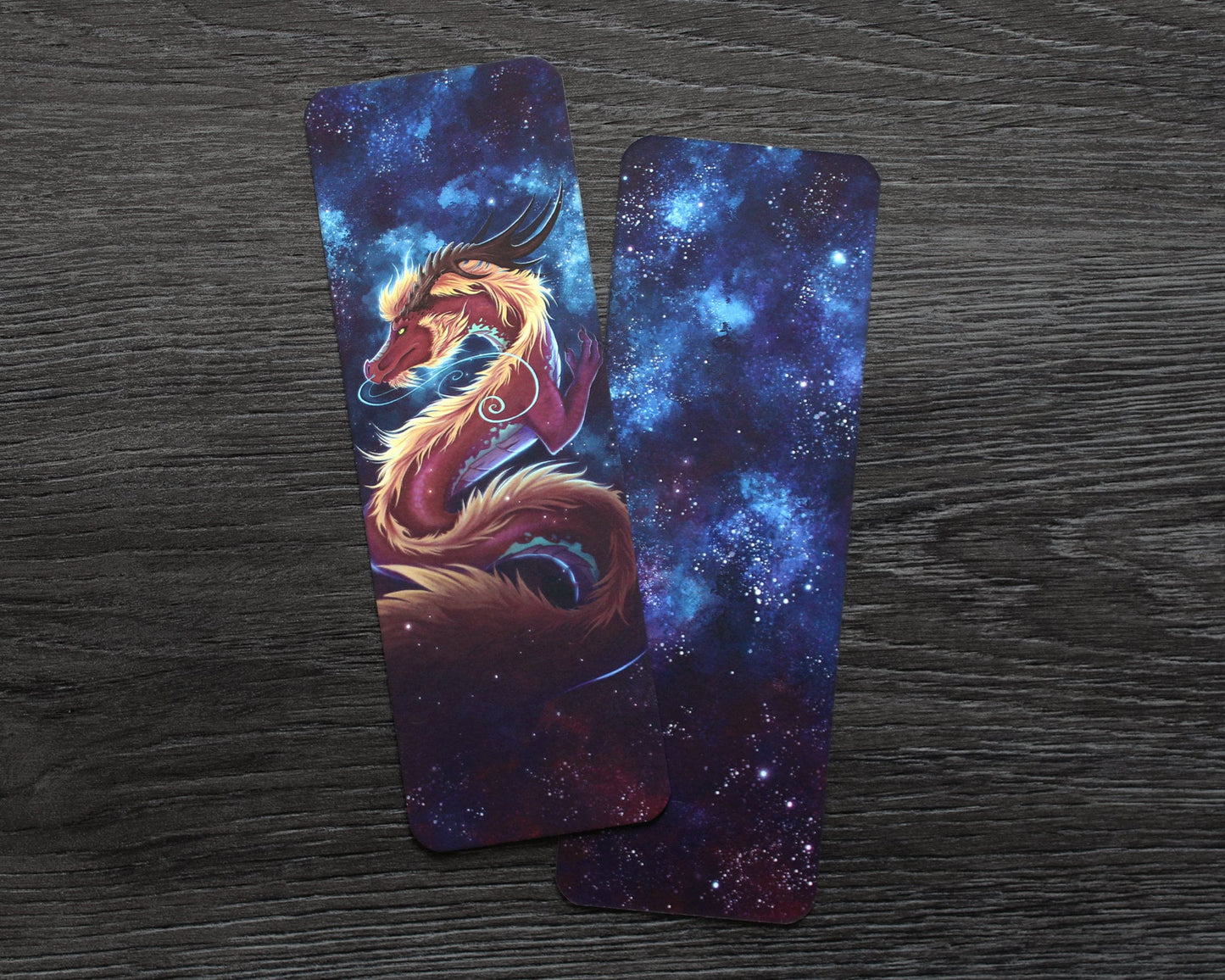 Bookmark of a red and gold eastern dragon on a blue space background